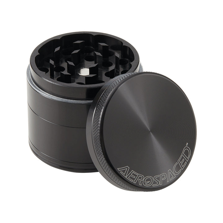 Black Aeropspaced 4 piece grinder with lid off.