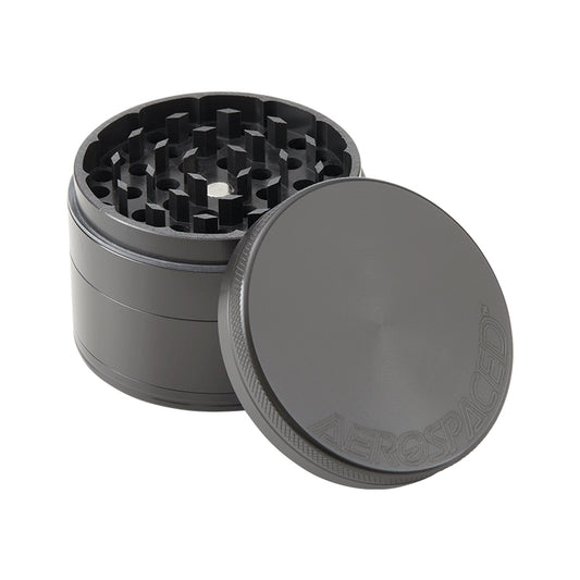 Large black 4 piece Aeropspaced grinder with lid off.