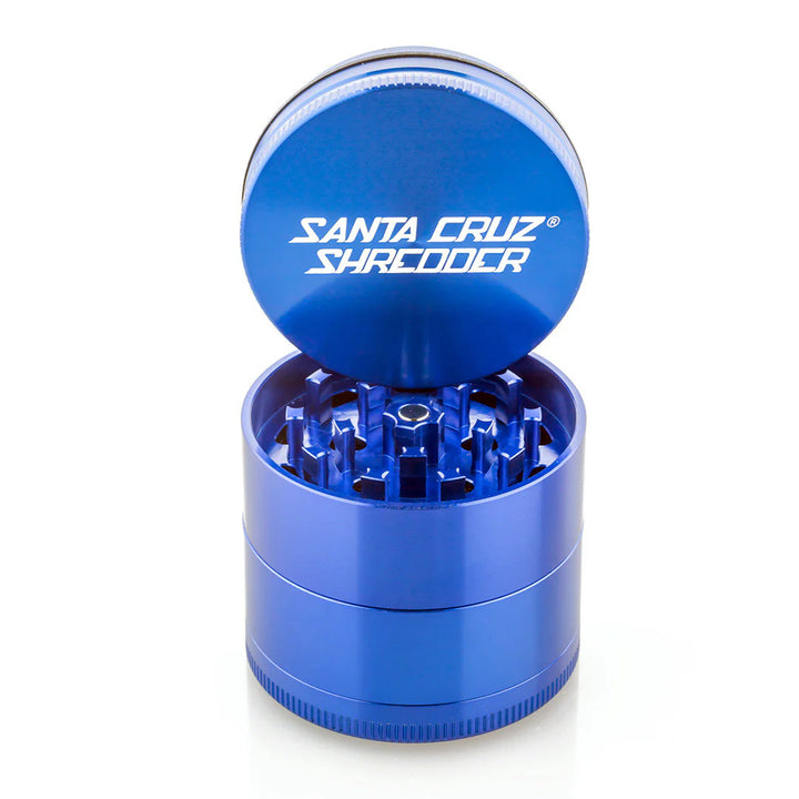 Blue Medium 4 Piece grinder with lid off.